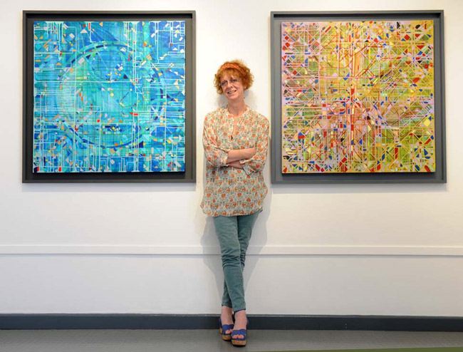 The artist Francesca Wilkinson Shaw with exhibition paintings